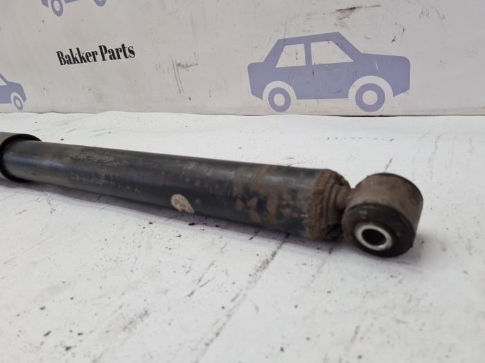 Stötdämparstång, vänster bak från en Ford C-Max (DM2) 1.8 16V 2008