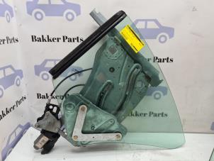 Gebruikte Raammechaniek 2Deurs links-achter Renault Megane II CC (EM) 1.6 16V Prijs € 175,00 Margeregeling aangeboden door Bakker Parts