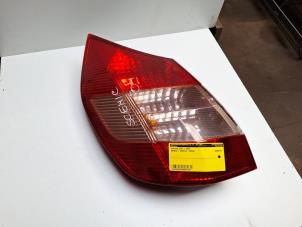 Gebruikte Achterlicht links Renault Scenic Prijs € 24,20 Inclusief btw aangeboden door Autodemontagebedrijf W. de Laat