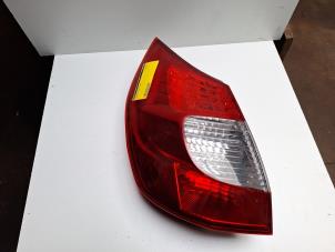 Gebruikte Achterlicht links Renault Scenic Prijs € 24,20 Inclusief btw aangeboden door Autodemontagebedrijf W. de Laat