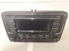 Radio CD Speler van een Volkswagen Polo V (6R) 1.2 TDI 12V BlueMotion 2011