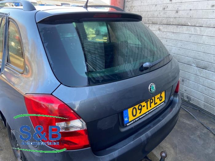 Skoda Fabia II Combi 1.2i 12V Sloopvoertuig (2012, Grijs)