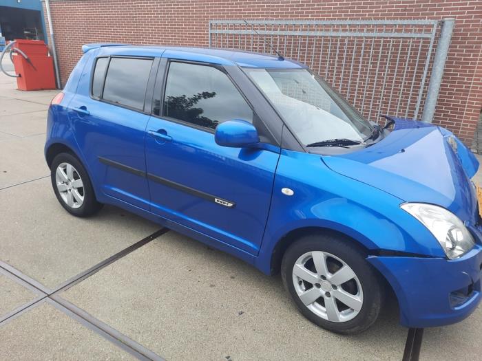 Suzuki Swift Sloopvoertuig (2009, Blauw)