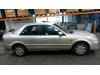 Mazda 323 1.6 16V Skrotfordon (2002, GRIJS 4F)