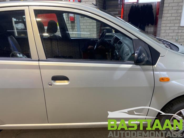 Daihatsu Cuore 1.0 12V DVVT Sloopvoertuig (2003, Beige)