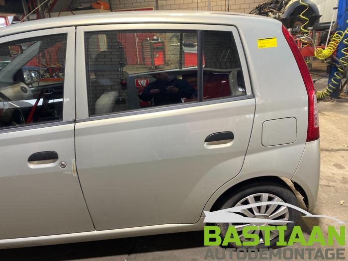 Daihatsu Cuore 1.0 12V DVVT Sloopvoertuig (2003, Beige)