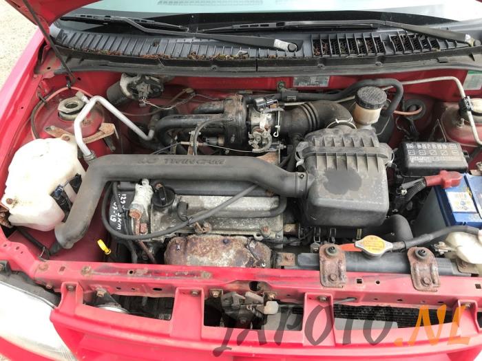 Daihatsu Cuore 1.0 12V Skrotfordon (2001, ROOD)