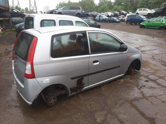 Daihatsu Cuore 1.0 12V DVVT Skrotfordon (2007, GRIJS)