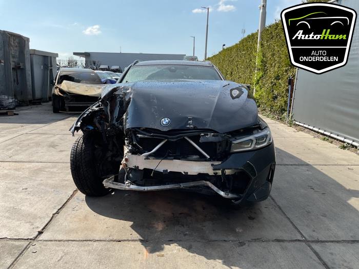 BMW 3 serie Touring 330e 2.0 TwinPower Turbo 16V Sloopvoertuig (2023, Zwart)