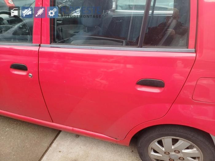 Daihatsu Cuore 1.0 12V DVVT Skrotfordon (2004, ROOD)