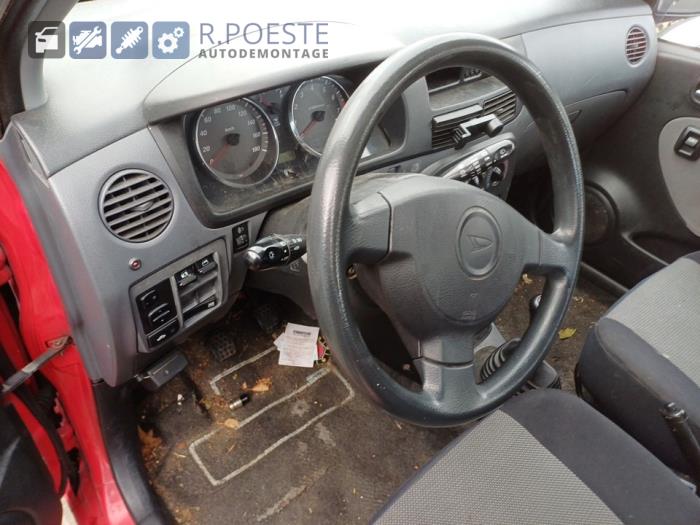 Daihatsu Cuore 1.0 12V DVVT Skrotfordon (2004, ROOD)