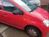 Daihatsu Cuore 1.0 12V DVVT Skrotfordon (2004, ROOD)